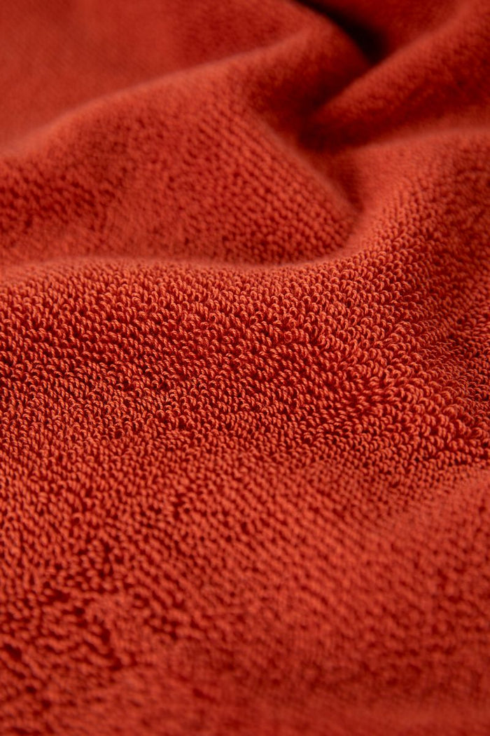 Sissy-Boy Donkeroranje handdoek en theedoek