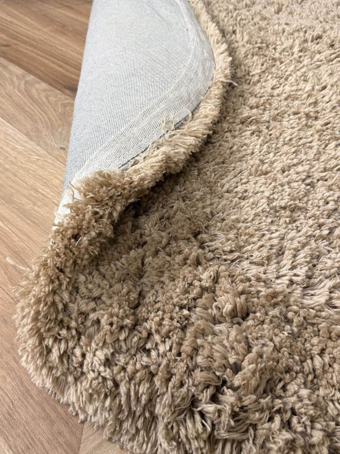 Rond hoogpolig vloerkleed Pilo taupe polyester Interieur05
