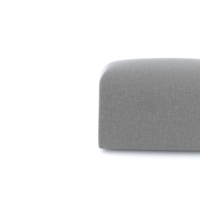 Poef van lichtgrijze geweven stof