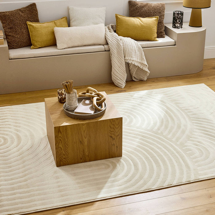 sweeek - Crèmekleurig tapijt met boogmotief voor binnen