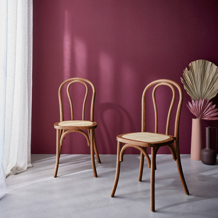 sweeek - Vintage rubberhouten en rotan stoelen (set van 2)