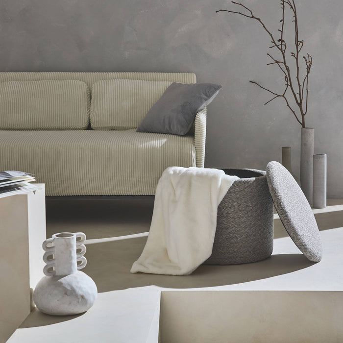 sweeek - Stoffen poef met opbergruimte