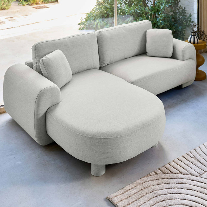 sweeek - Linkerhoekbank 3-zits stof, ronde poten