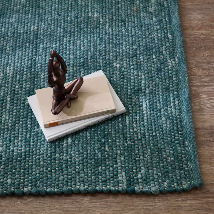 Theko Handgeweven wollen tapijt Alpen 140x200 cm - Petrolblauw