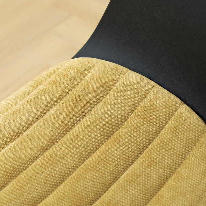 Nolon Nola-Liz draaibare eetkamerstoel zwart met warm oker zitkussen -