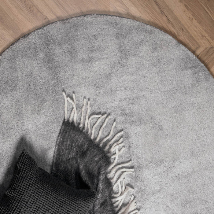 Hioshop Undra vloerkleed Ø200 cm polyester grijs.