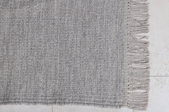 Hioshop Cyrus vloerkleed 230x160 cm wol grijs.