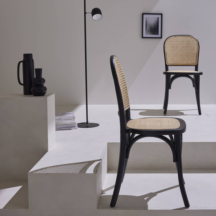 sweeek - Houten en rotan vintage stoelen (set van 2)