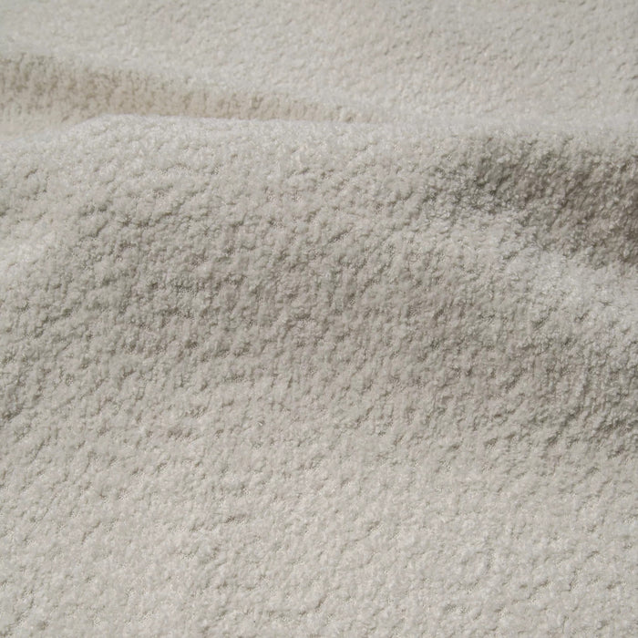 Brede hoekbank bouclette creme 280cm