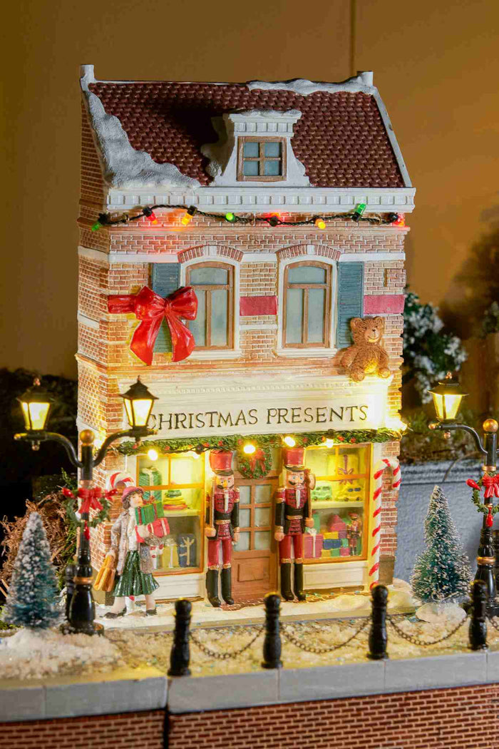 Luville Kerstdorp Kerstcadeautjes Winkel - 19x9x26.5 cm - Polyresin - Multi