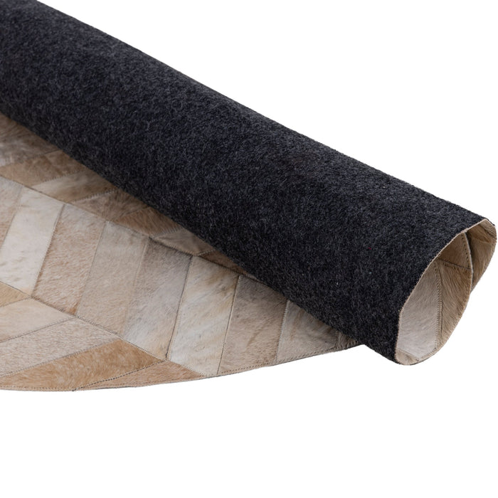 PTMD Joanne Beige cowhair patchwork carpet round L