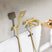 Beliani - TARAPOTO - Wandgemonteerde badmengkraan - Goud - Messing