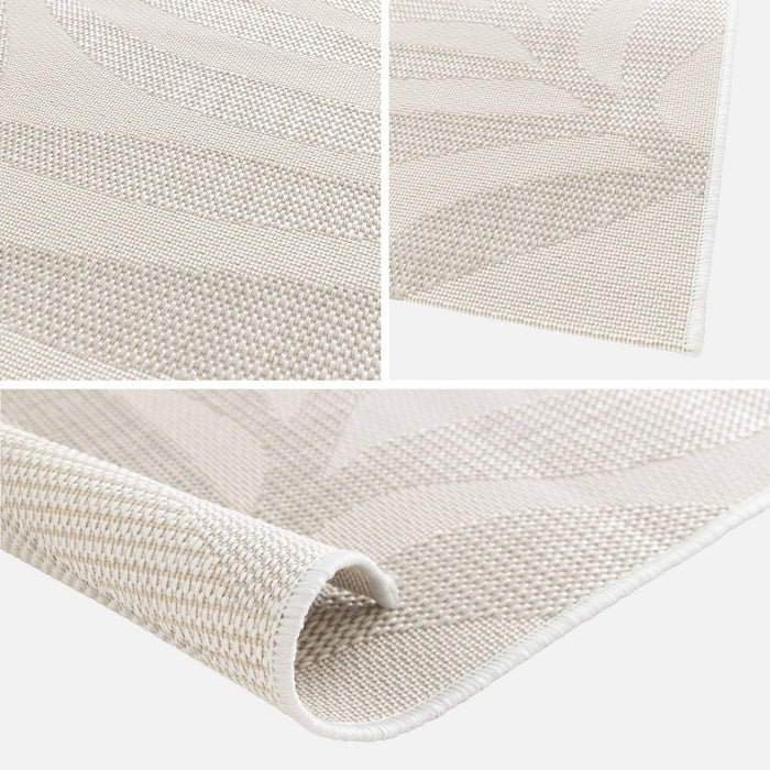 sweeek - Binnen-|buitentapijt met plant motief, crème en beige