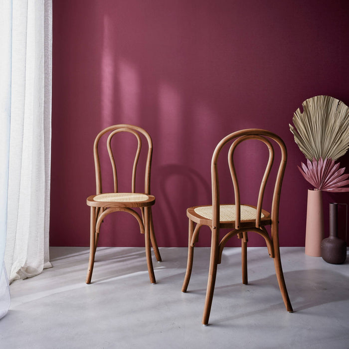 sweeek - Vintage rubberhouten en rotan stoelen (set van 2)