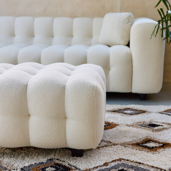 sweeek - Poef, bouclé voetenbankje voor 3-zitsbank Leon