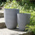 Beliani - CROTON - Bloempot set van 2 - Lichtgrijs - 35 cm - Stenenmix